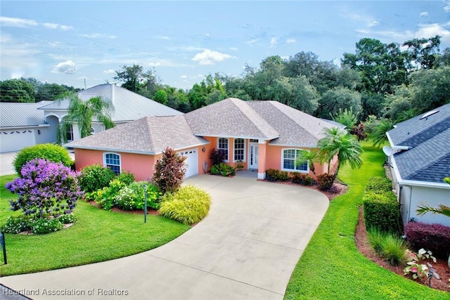 ranch-style home featuring a garage and a front lawn