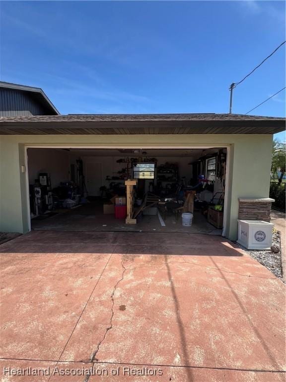 garage with driveway