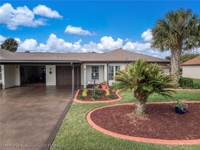 ranch-style home featuring brick siding, driveway, a garage, and roof with shingles