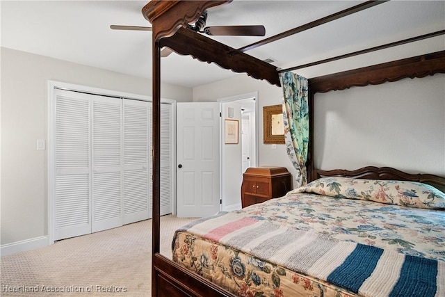 bedroom featuring a closet, baseboards, ceiling fan, and carpet flooring