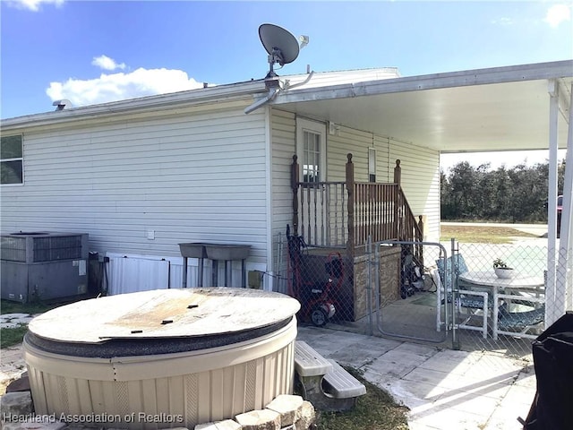 view of property exterior with central air condition unit