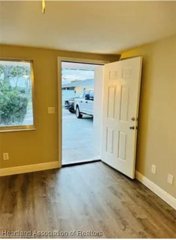 doorway to outside featuring hardwood / wood-style floors