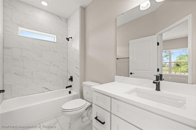 4924 San Lorenzo Dr, Sebring, FL 33872 - full bath featuring washtub / shower combination, vanity, recessed lighting, toilet, and marble finish floor