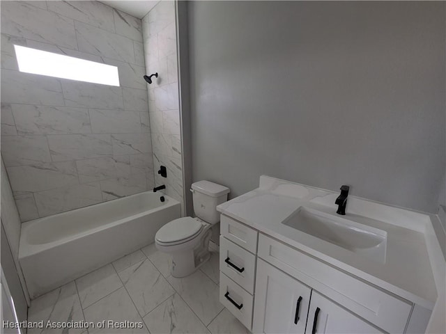 full bathroom with tiled shower / bath combo, toilet, and vanity