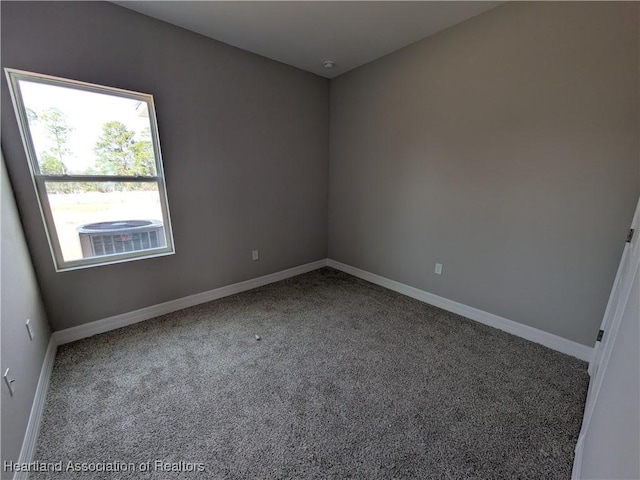 unfurnished room with carpet floors