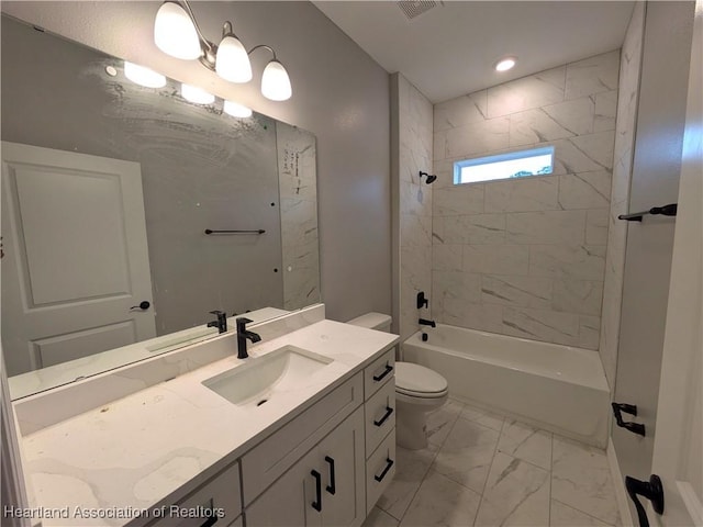 full bathroom with tiled shower / bath combo, vanity, and toilet