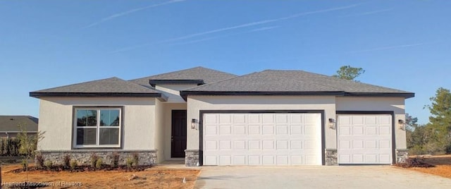 prairie-style home featuring a garage