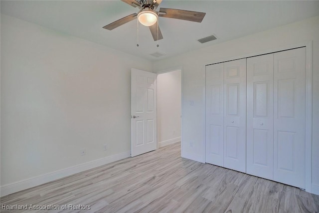 unfurnished bedroom featuring a closet, ceiling fan, and light hardwood / wood-style floors