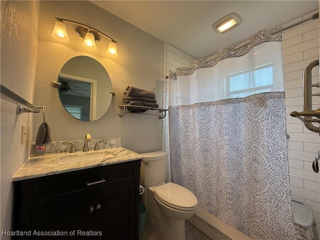 3711 Perugia Ave, Sebring, FL 33872 - bathroom featuring toilet, ceiling fan, a shower with shower curtain, and vanity