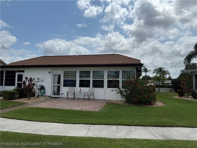 3711 Perugia Ave, Sebring, FL 33872 - view of front of home featuring a front lawn and a patio