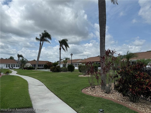 3711 Perugia Ave, Sebring, FL 33872 - view of grassy yard featuring a residential view