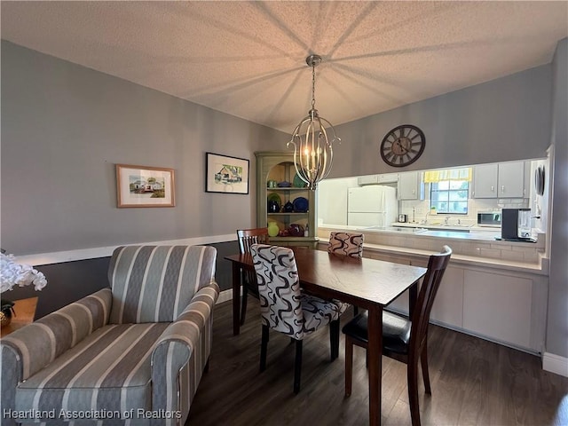 3711 Perugia Ave, Sebring, FL 33872 - dining space with dark wood-style floors and a chandelier