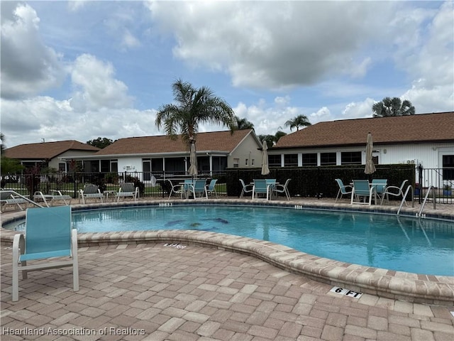 3711 Perugia Ave, Sebring, FL 33872 - community pool featuring fence and a patio
