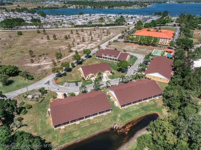 drone / aerial view with a water view