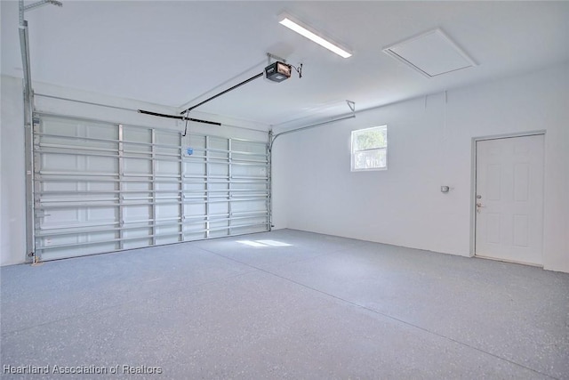 garage featuring a garage door opener