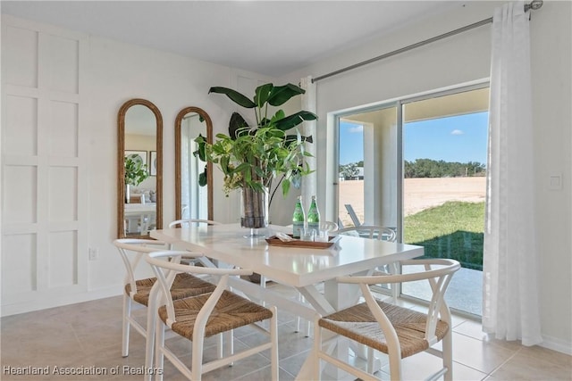 6856 Coconut Dr, Sebring, FL 33872 - dining area featuring light tile patterned flooring