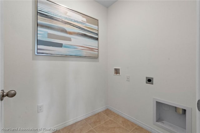 6856 Coconut Dr, Sebring, FL 33872 - washroom featuring electric dryer hookup, hookup for a washing machine, light tile patterned floors, and baseboards