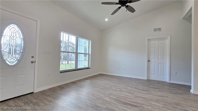 entryway featuring ceiling fan, light hardwood / wood-style floors, and vaulted ceiling