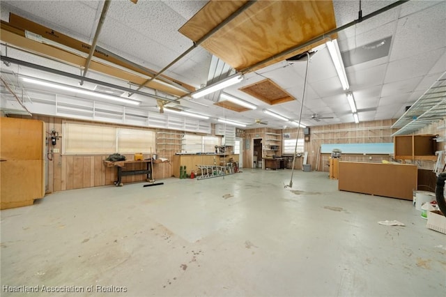 302 S Egret St, Sebring, FL 33870 - garage featuring a workshop area