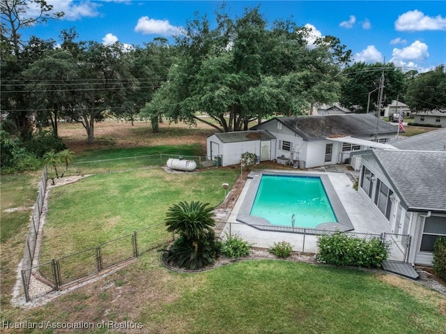 302 S Egret St, Sebring, FL 33870 - view of swimming pool featuring a shed, a gate, and an outdoor structure