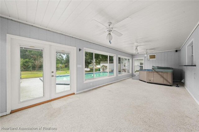 302 S Egret St, Sebring, FL 33870 - unfurnished sunroom featuring a jacuzzi, french doors, and ceiling fan