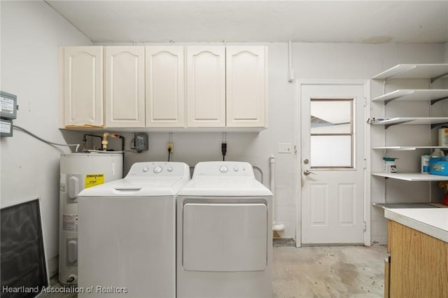 302 S Egret St, Sebring, FL 33870 - washroom with electric water heater, cabinet space, and washer and dryer