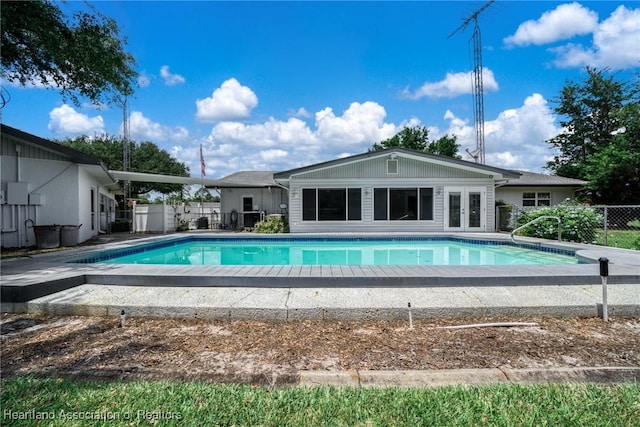 302 S Egret St, Sebring, FL 33870 - view of pool with french doors, fence, and a patio