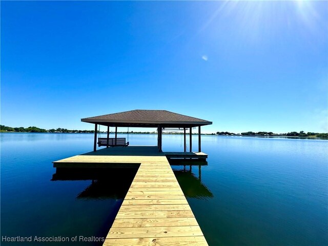 view of dock with a water view