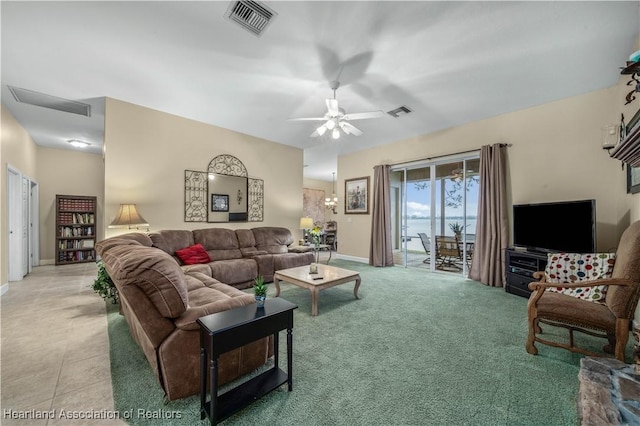 living room with light carpet and ceiling fan