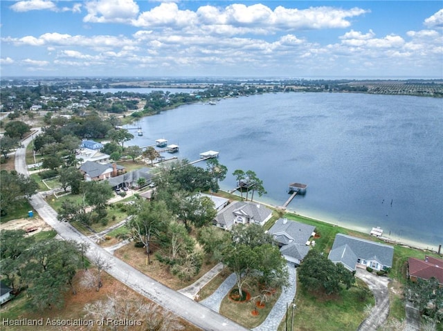 drone / aerial view with a water view