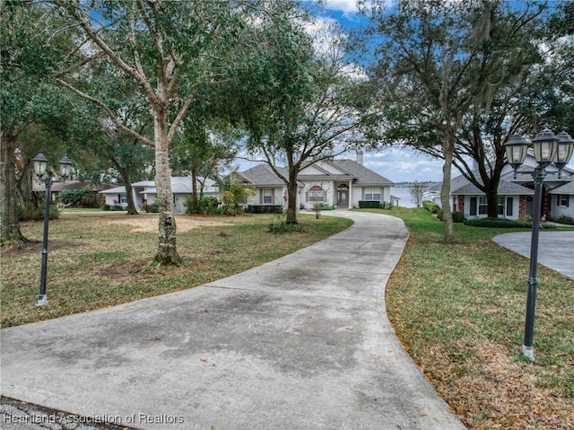 view of front of house with a front lawn