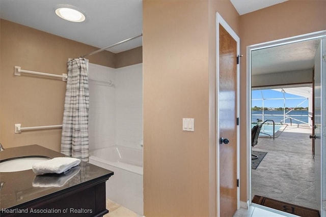 full bathroom with shower / bathtub combination with curtain and vanity