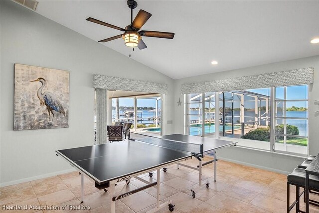 rec room featuring recessed lighting, baseboards, ceiling fan, and vaulted ceiling