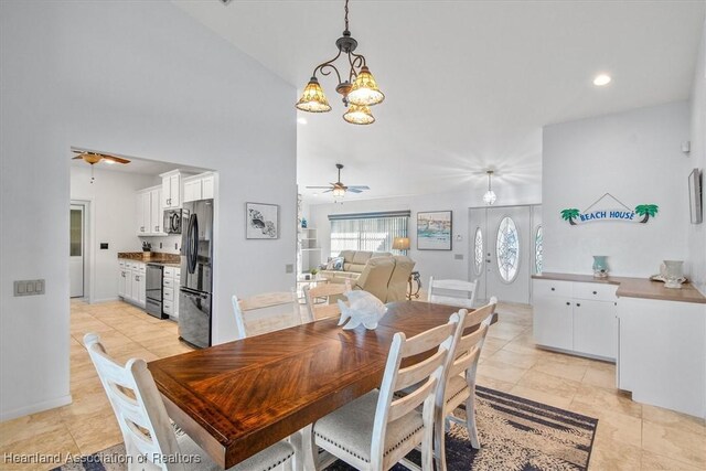 dining area with recessed lighting, ceiling fan with notable chandelier, and light tile patterned floors