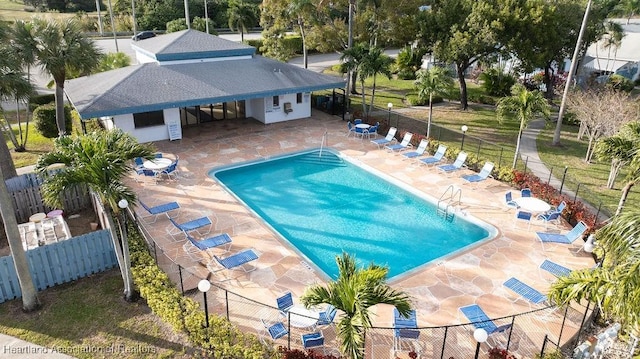 view of swimming pool featuring a patio area