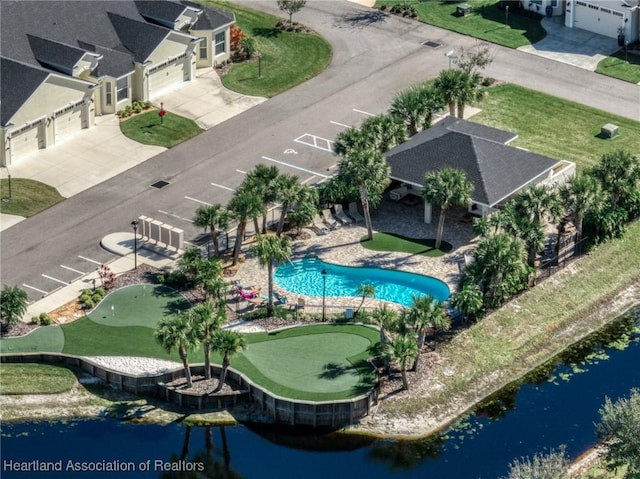 bird's eye view with a water view