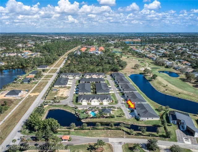 birds eye view of property featuring a water view