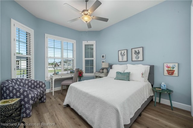 bedroom featuring wood-type flooring and ceiling fan