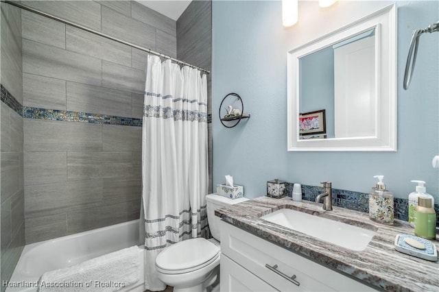 full bathroom featuring vanity, toilet, and shower / bath combo with shower curtain