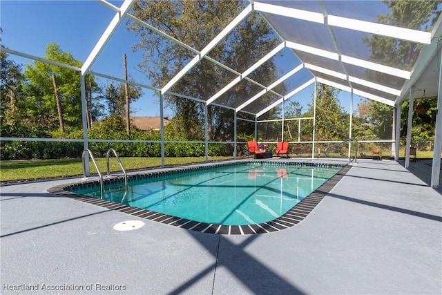 pool with a lanai and a patio