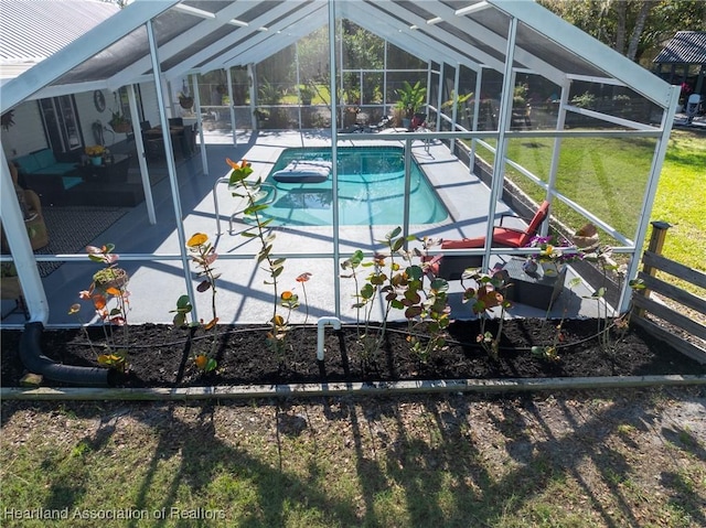 pool with a yard, a lanai, and a patio