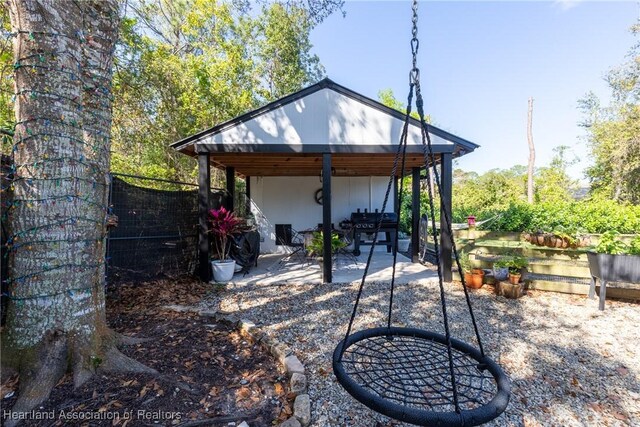 view of patio / terrace with fence