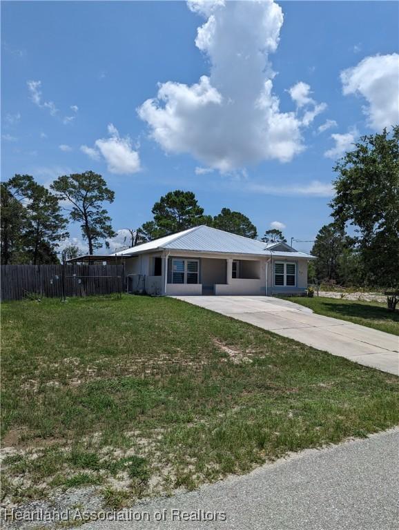 2146 Hartman Rd, Avon Park, FL 33825 - view of front of house featuring concrete driveway