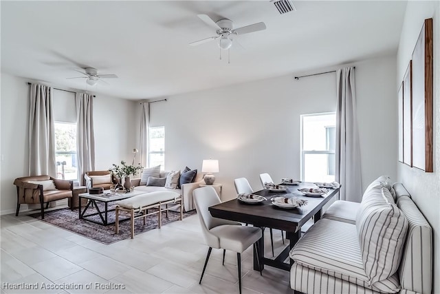 dining area with ceiling fan