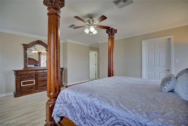 bedroom featuring crown molding, light hardwood / wood-style floors, and ceiling fan