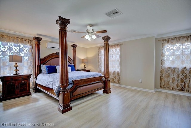 bedroom with crown molding, ceiling fan, a wall mounted AC, and light hardwood / wood-style flooring