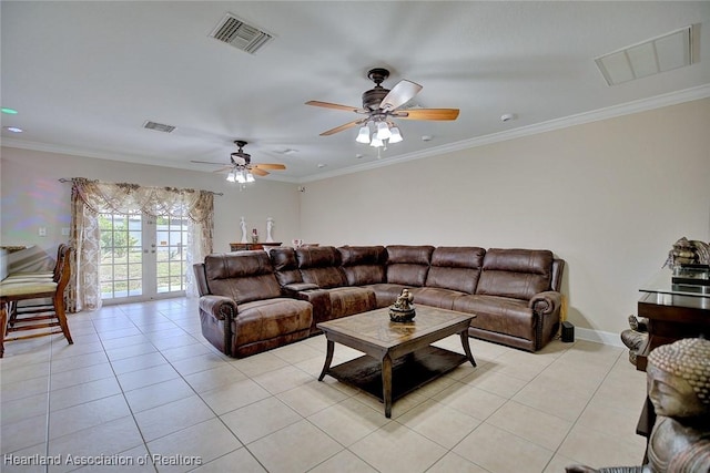 tiled living room with french doors, ceiling fan, and crown molding