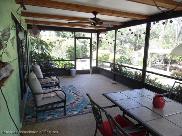 1605 Lake Clay Dr, Lake Placid, FL 33852 - sunroom / solarium featuring ceiling fan, outdoor dining area, and beamed ceiling