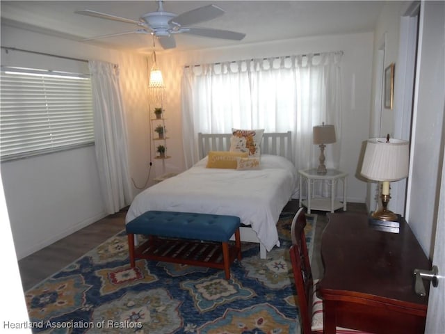 1605 Lake Clay Dr, Lake Placid, FL 33852 - bedroom featuring baseboards, wood finished floors, and ceiling fan