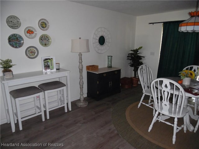 1605 Lake Clay Dr, Lake Placid, FL 33852 - dining space featuring wood finished floors and baseboards